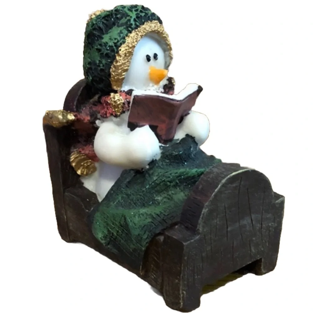 Festive Snowman Figurine with Green and Gold Accents